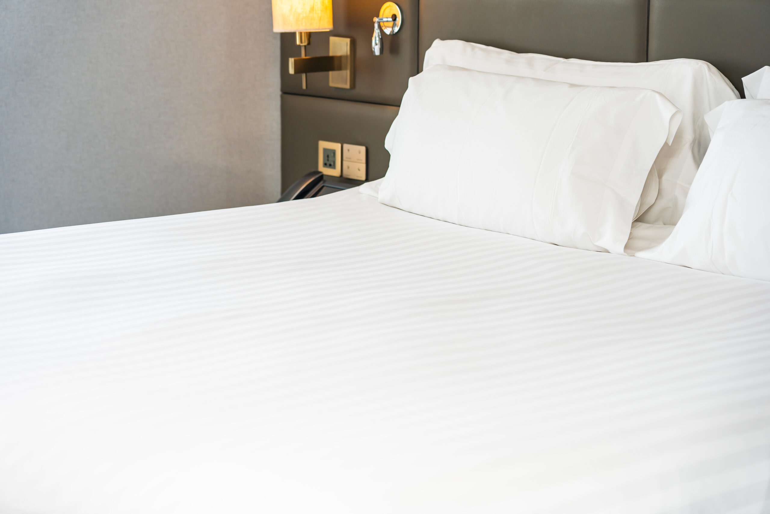 White pillow on bed decoration interior of bedroom